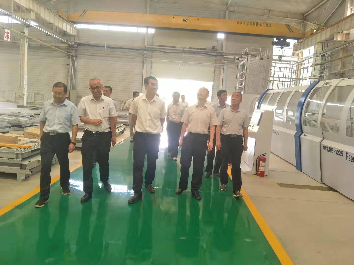 天津市社会动员专项工作组办公室一行参观考察“36365线路检测中心·伊士顿”电梯厂